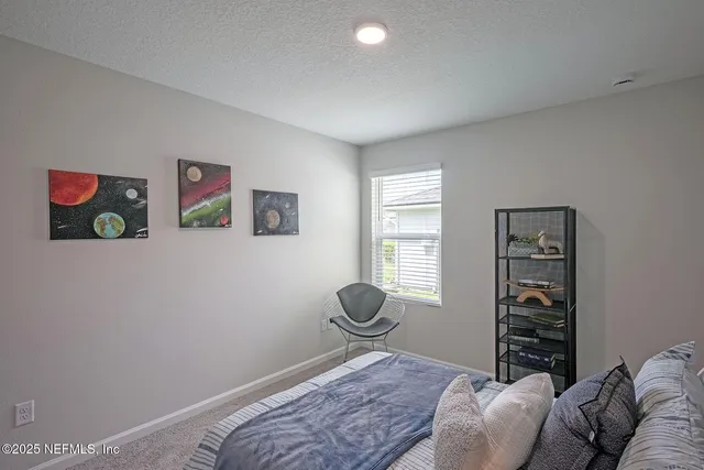 a house view with a garden space