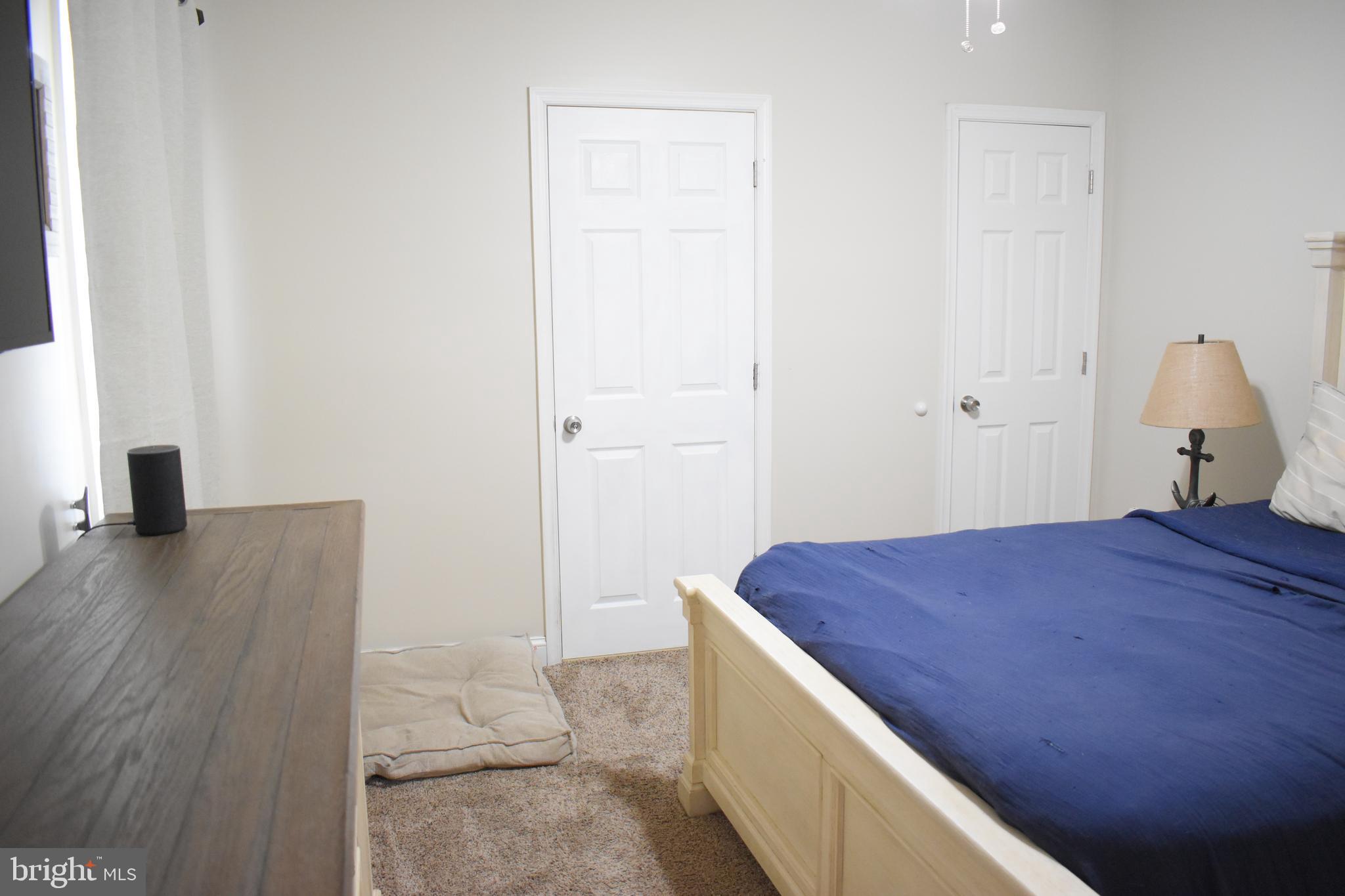 1311 4th Road Baltimore, MD 21220 - Photo 11 of 23 Master bedroom with adjoining full bath