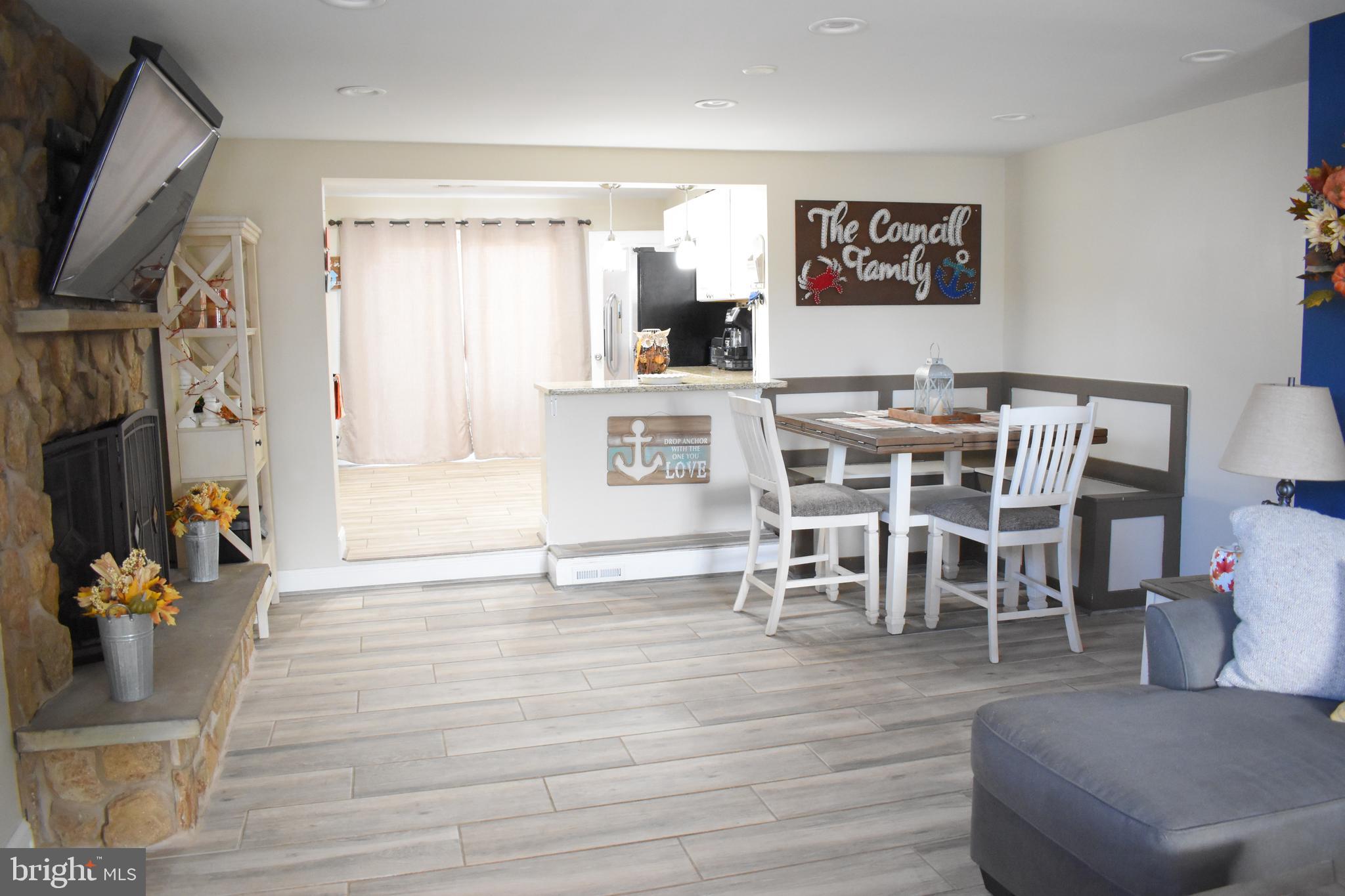 1311 4th Road Baltimore, MD 21220 - Photo 6 of 23 separate dining room (ceramic flooring throughout)