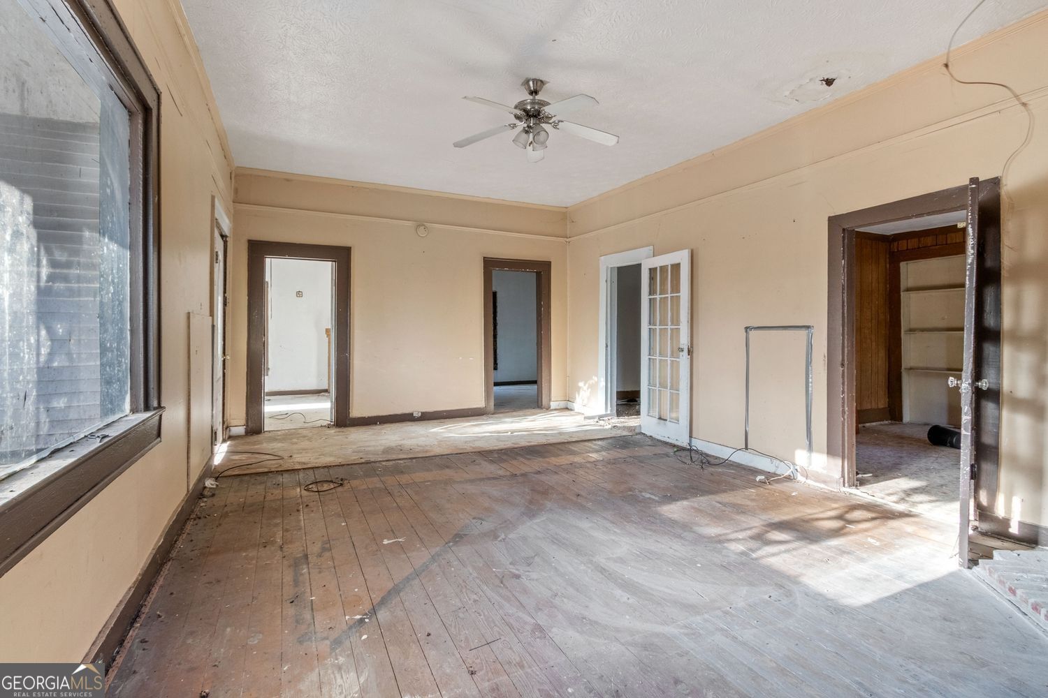812 Effie Street Waycross, GA 31501 - Photo 2 of 12 a view of a hallway with a chandelier