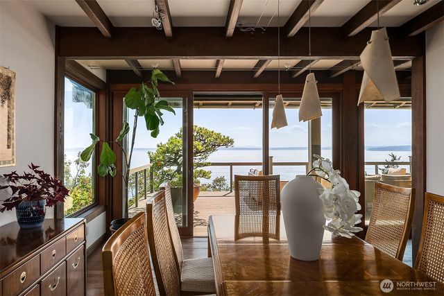 a view of dining room with furniture window and outside view