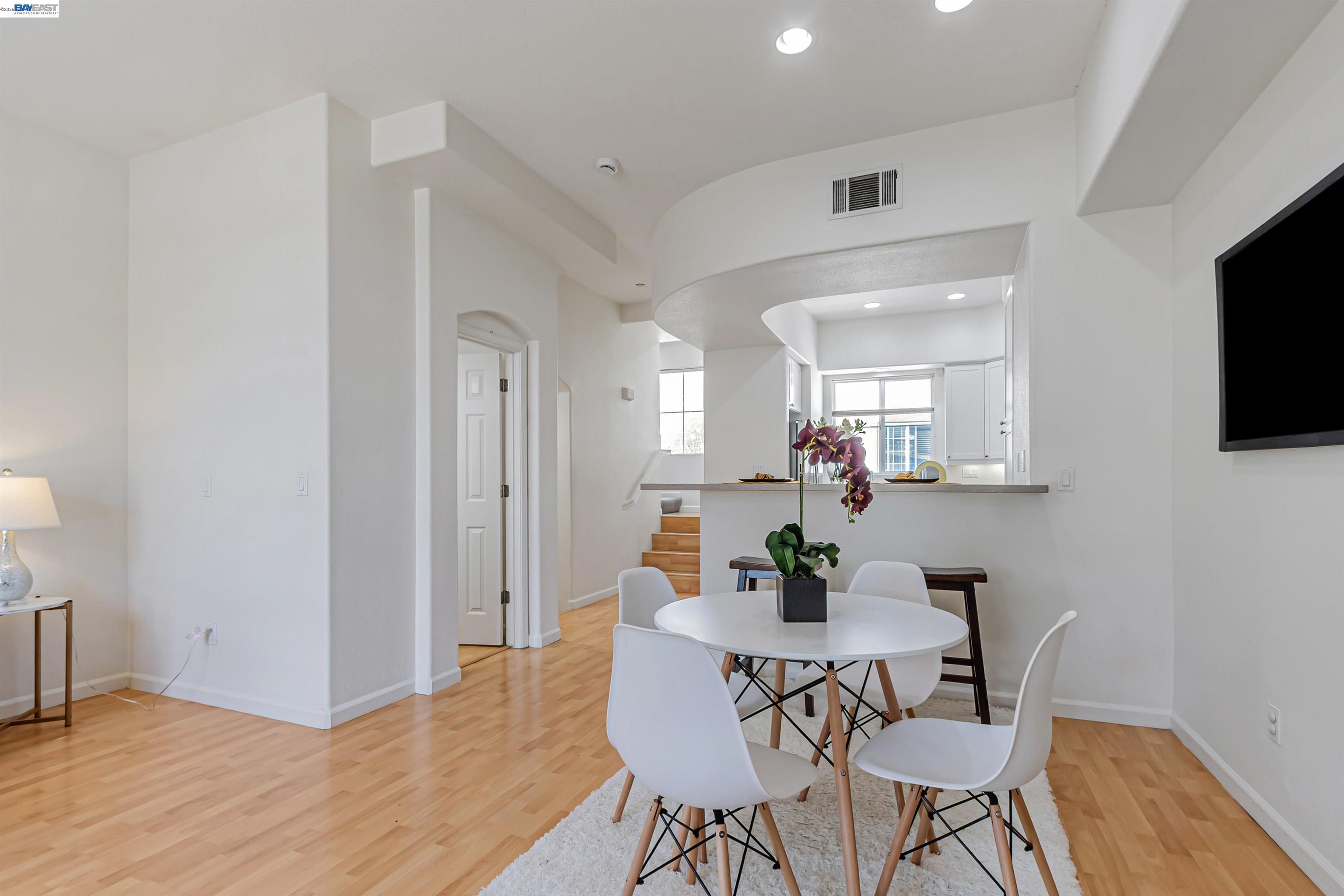 39 Cloud Walk Milpitas, CA 95035 - Photo 14 of 39 a view of a dining room with furniture and wooden floor