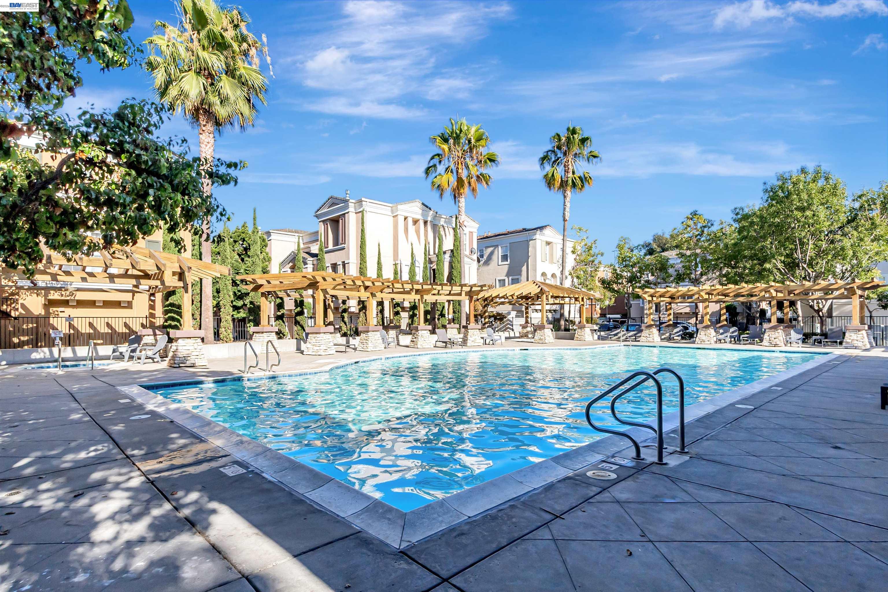 39 Cloud Walk Milpitas, CA 95035 - Photo 37 of 39 a view of a swimming pool with a patio