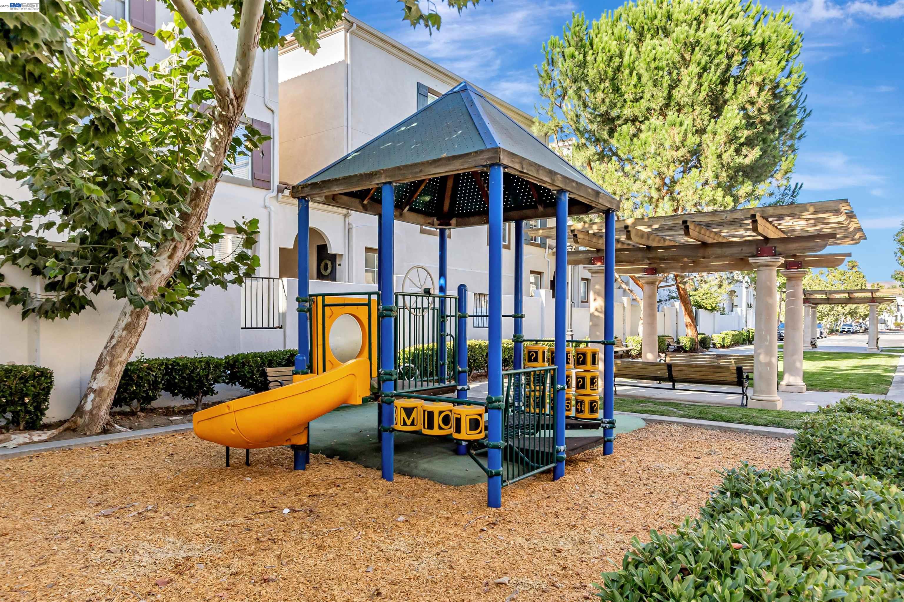 39 Cloud Walk Milpitas, CA 95035 - Photo 38 of 39 an outdoor space with seating