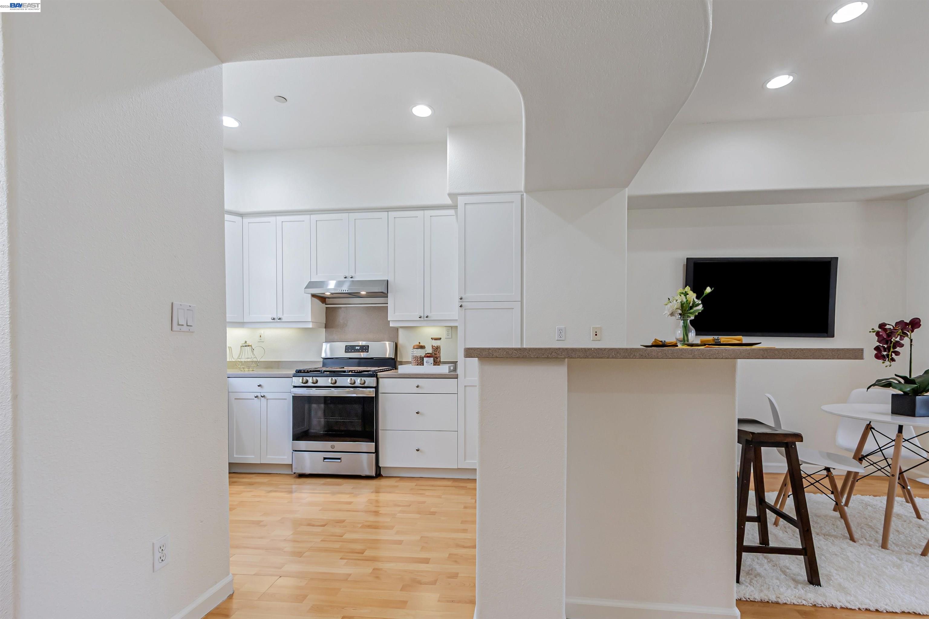 39 Cloud Walk Milpitas, CA 95035 - Photo 6 of 39 a kitchen with stainless steel appliances granite countertop a stove and a sink