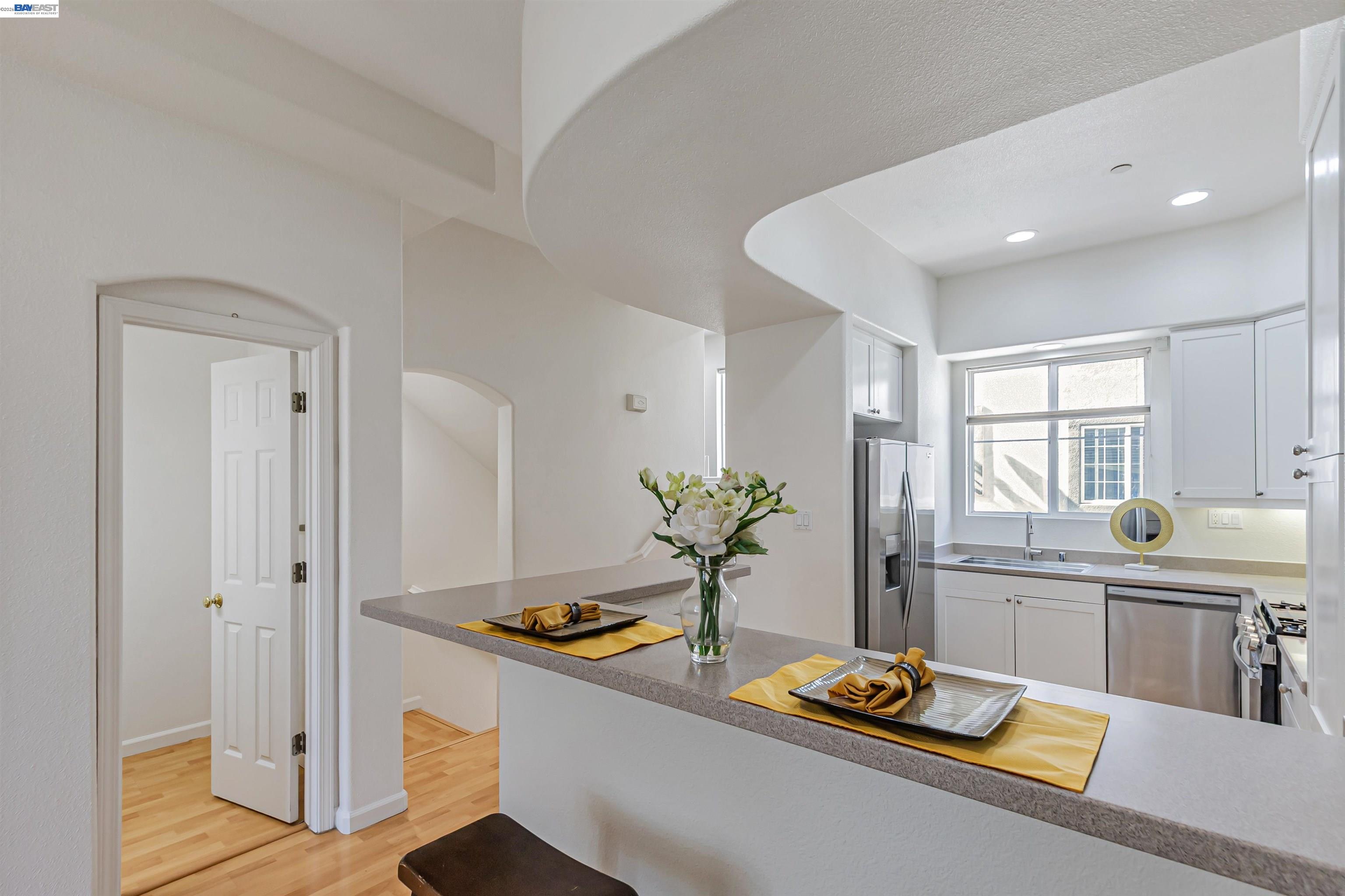 39 Cloud Walk Milpitas, CA 95035 - Photo 8 of 39 a living room with hard wood flooring and glass door