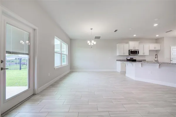 a view of a chandelier and entryway