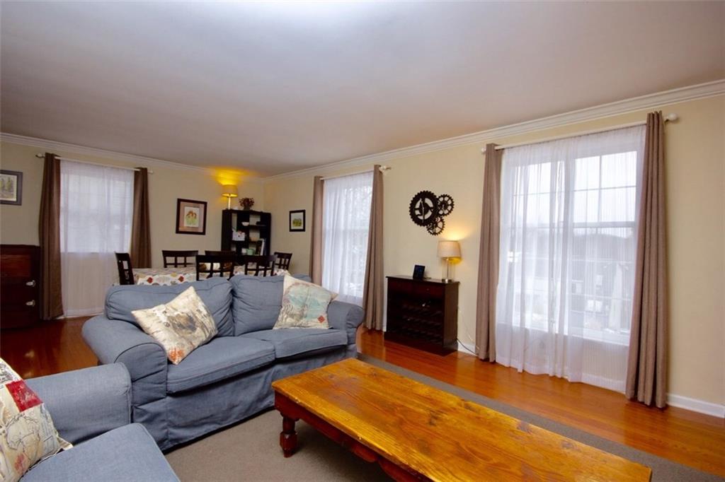 231 Sunridge Road Pittsburgh, PA 15238 - Photo 11 of 25 Formal living room with a dining room gets great natural light.