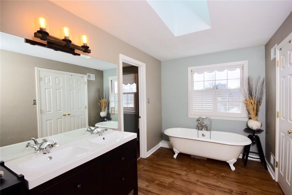 231 Sunridge Road Pittsburgh, PA 15238 - Photo 17 of 25 Master bathroom with double sinks - with an entrance to the shower & toilet; and with spacious walk-in closet.