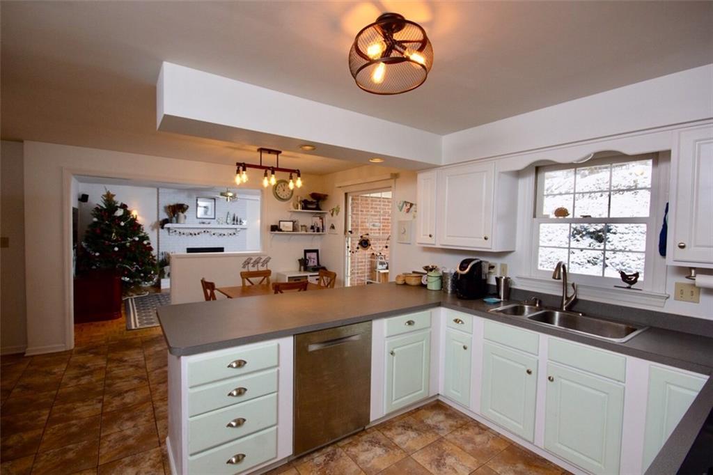 231 Sunridge Road Pittsburgh, PA 15238 - Photo 6 of 25 Kitchen, with stainless steel appliances opens to a large sunken breakfast & family room.