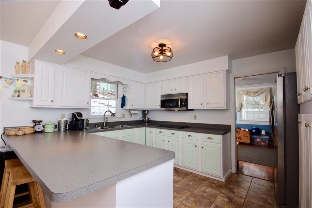 231 Sunridge Road Pittsburgh, PA 15238 - Photo 7 of 25 Kitchen also opens to a formal dining room (presently used as a playroom).