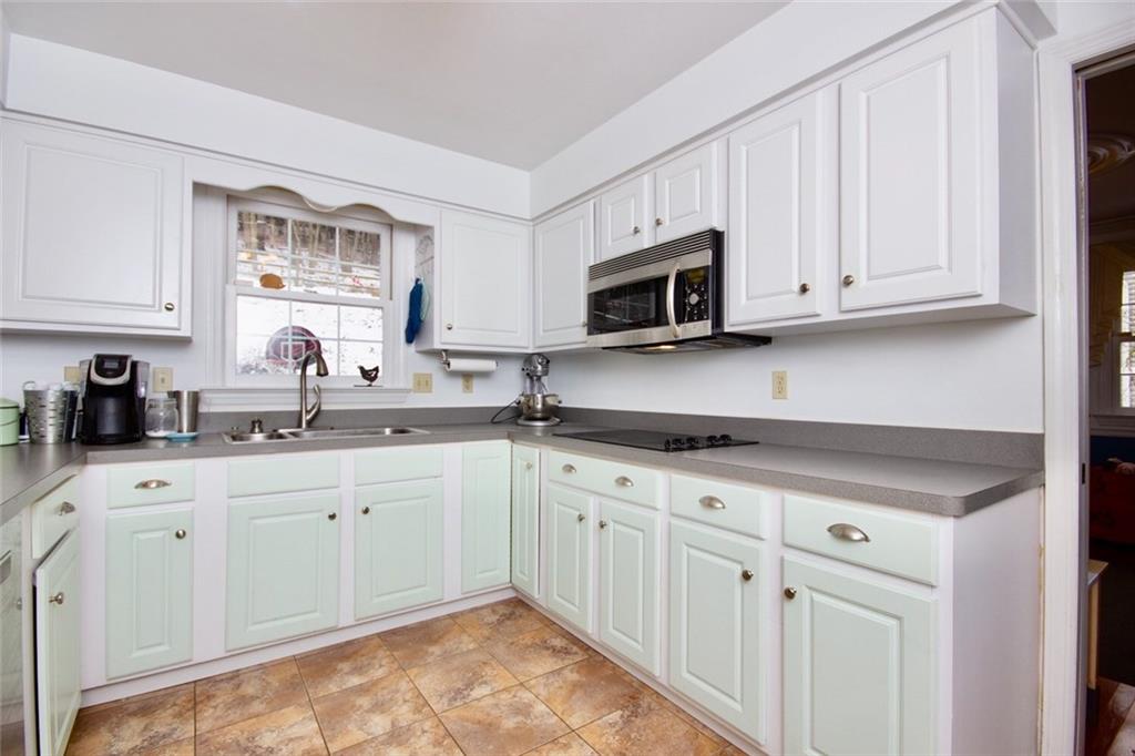 231 Sunridge Road Pittsburgh, PA 15238 - Photo 8 of 25 Kitchen has stainless steel appliances and tone of natural light!