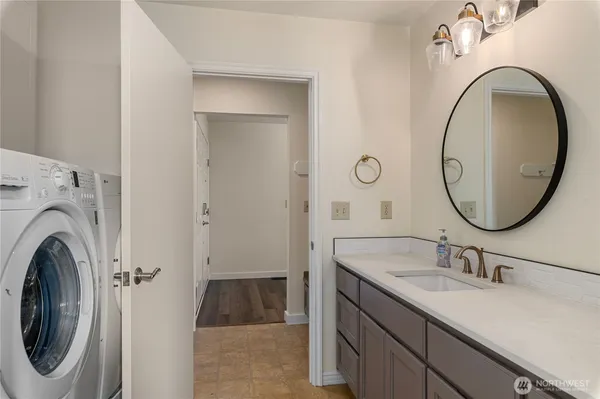 a bathroom with a sink and a mirror