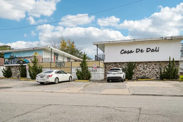 a car parked in front of a building