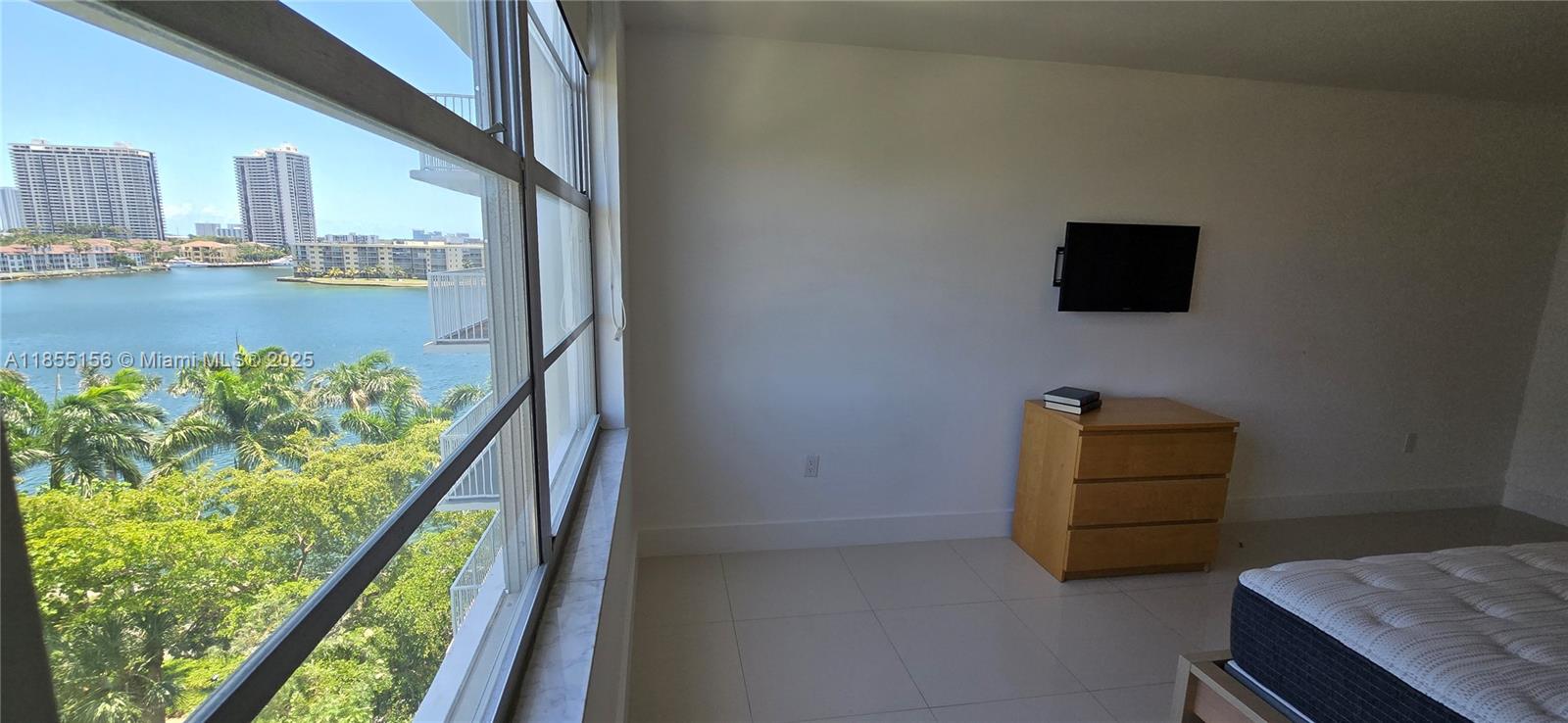 2801 Northeast 183rd Street, Unit 714W Aventura, FL 33160 - Photo 11 of 21 a view of a balcony with wooden floor