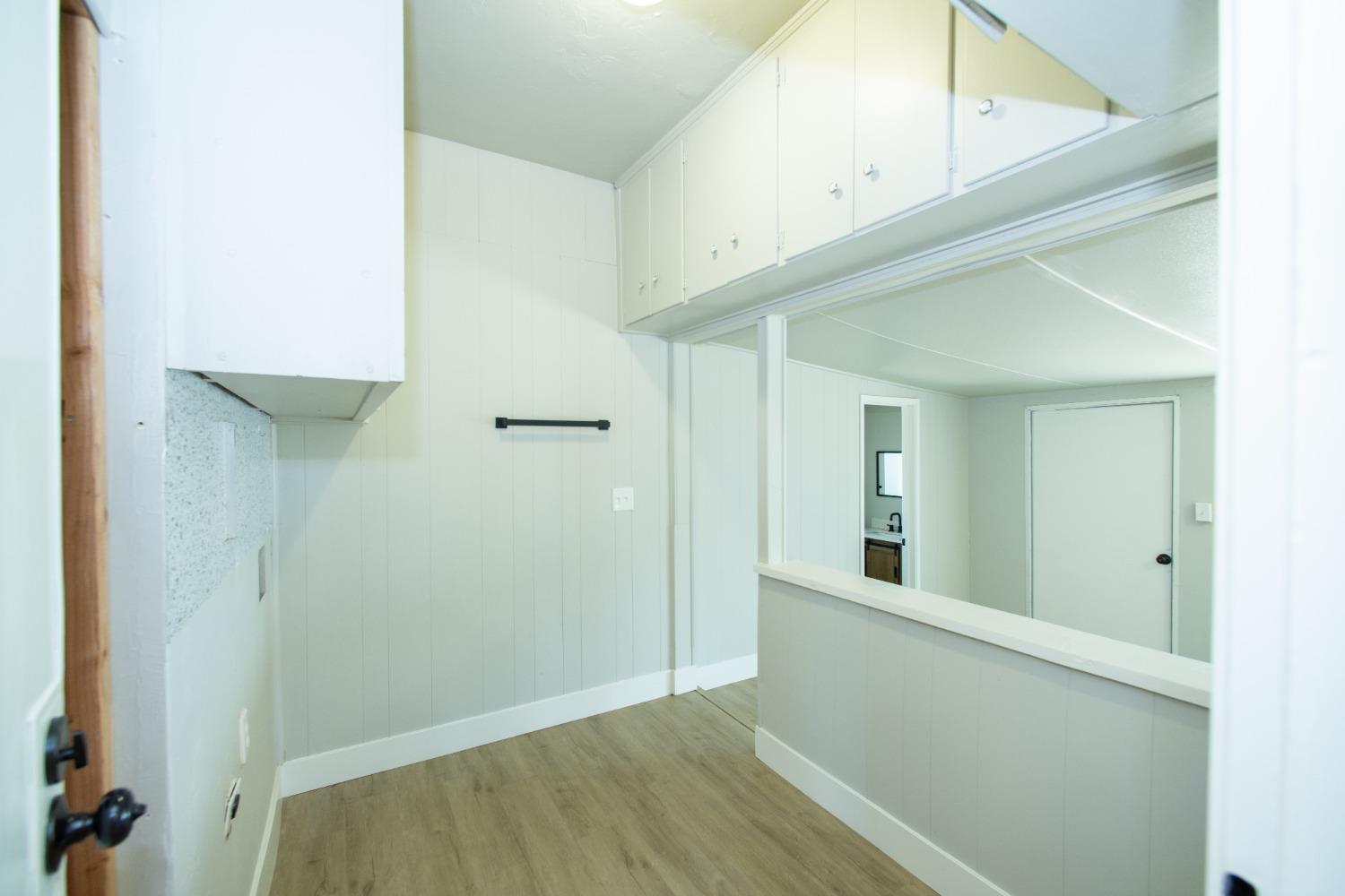 1136 East Griffith Way Fresno, CA 93704 - Photo 13 of 33 a view of a hallway