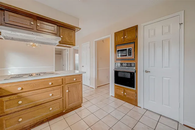 a bathroom with a sink a vanity and a mirror