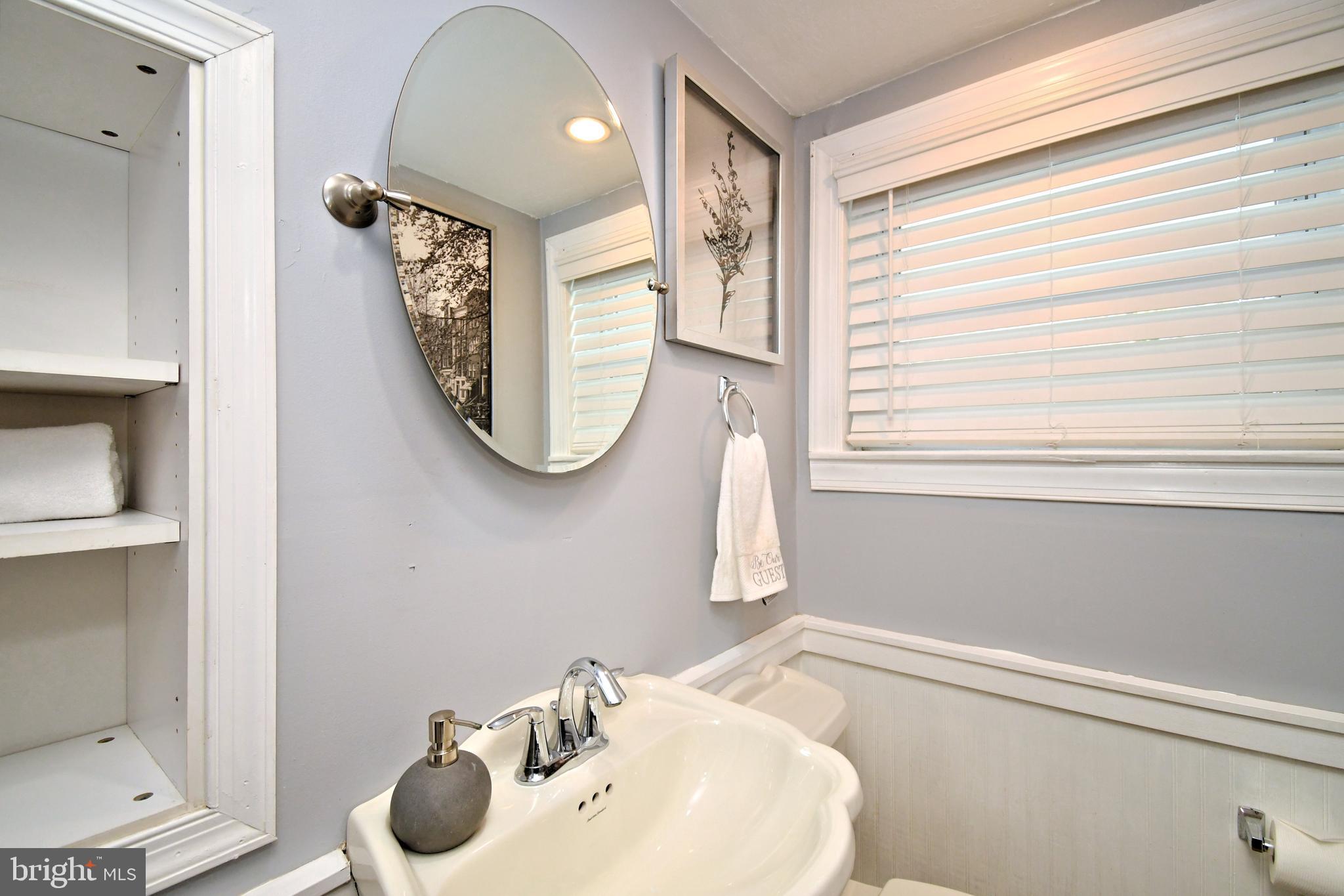 7 Sandy Drive Yardley, PA 19067 - Photo 31 of 42 a bathroom with a sink and a mirror