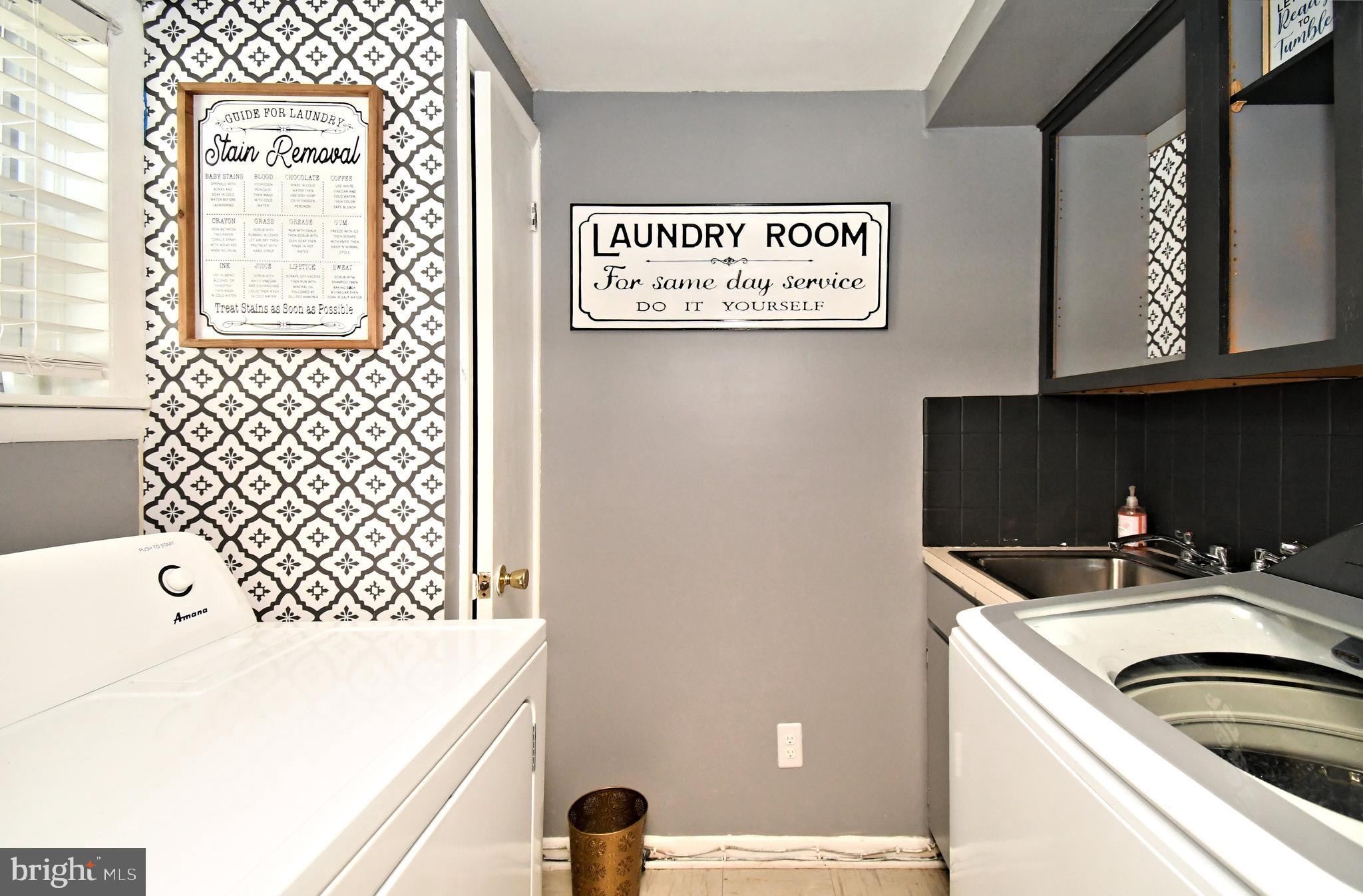 7 Sandy Drive Yardley, PA 19067 - Photo 32 of 42 a utility room with a sink a washer and dryer