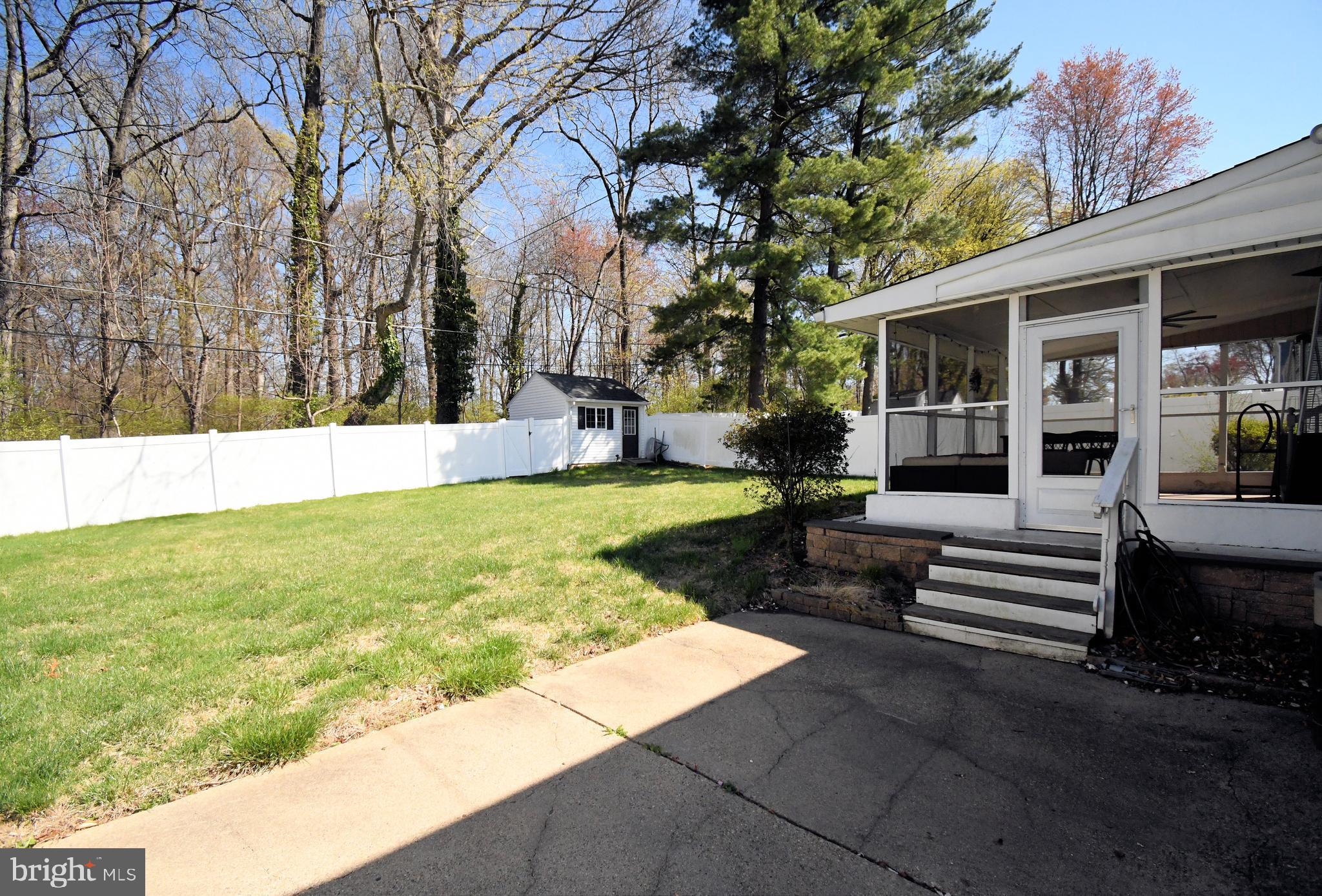 7 Sandy Drive Yardley, PA 19067 - Photo 36 of 42 a view of a house with backyard and sitting area