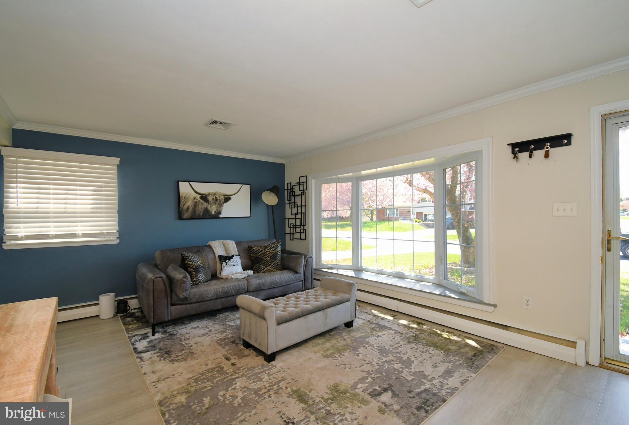 7 Sandy Drive Yardley, PA 19067 - Photo 7 of 42 a living room with furniture and a window