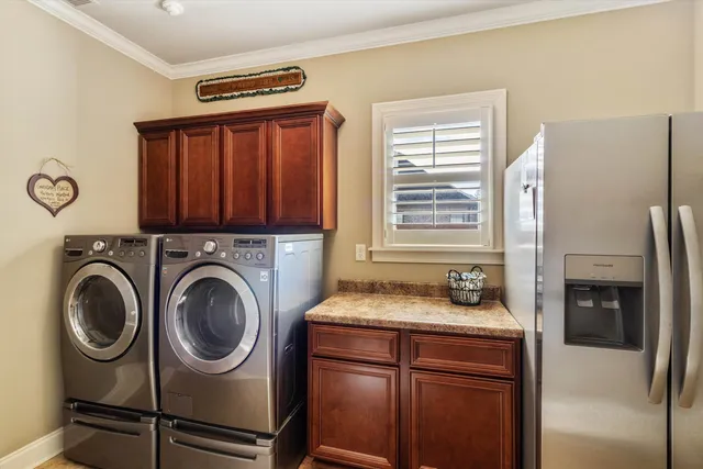 a dining room with furniture window and wooden floor