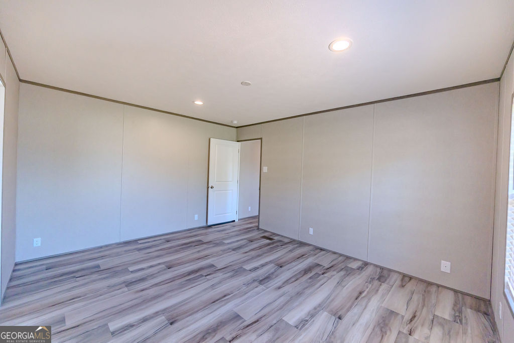 226 Mullis Street Dexter, GA 31019 - Photo 11 of 37 a view of an empty room