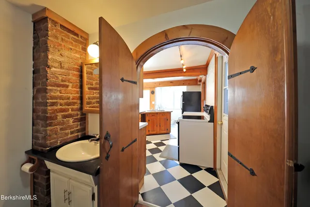 a room with stairs and a window