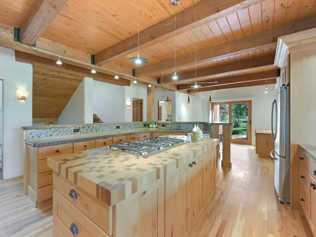 a view of a kitchen counter top space and wooden floor