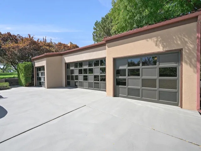 a view of a house with a large window and a large window