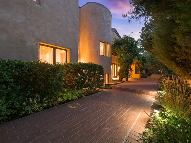 a view of a house with a street