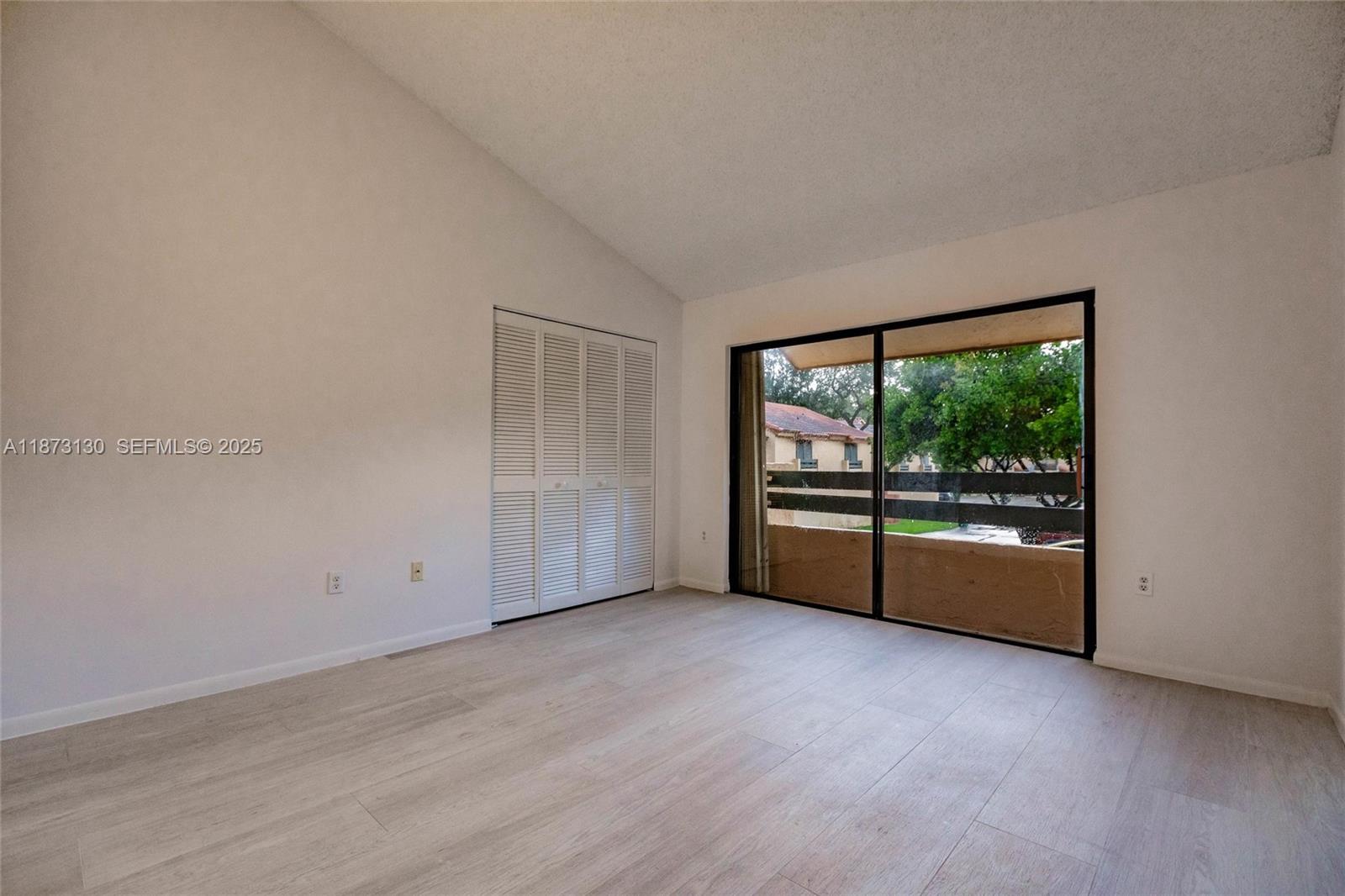 7820 Southwest 102nd Lane Miami, FL 33156 - Photo 16 of 31 a view of an empty room with a window