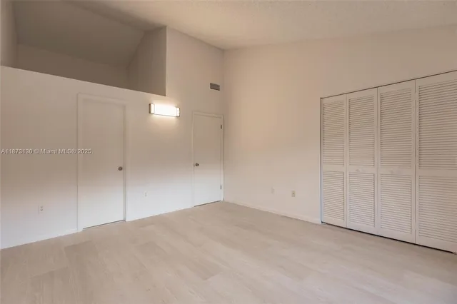 a bathroom with a double vanity sink and mirror