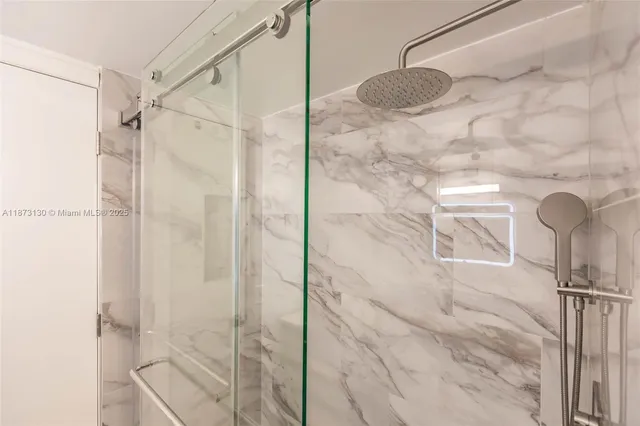 front view of a house with a potted plant