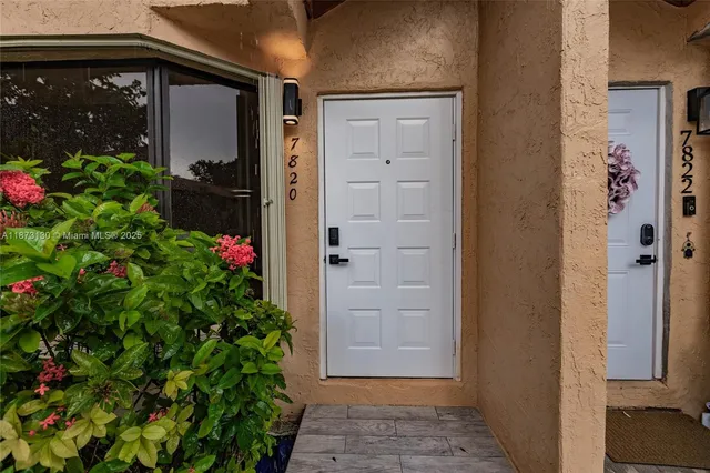 a car parked in front of a house