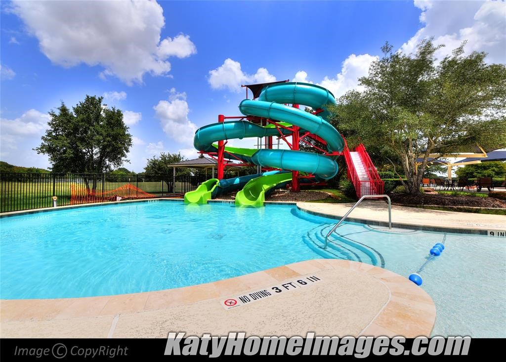 29023 Powder Ridge Drive Katy, TX 77494 - Photo 48 of 50 Check out the slide, a bonus activity for the kids that adds even more fun to the community!