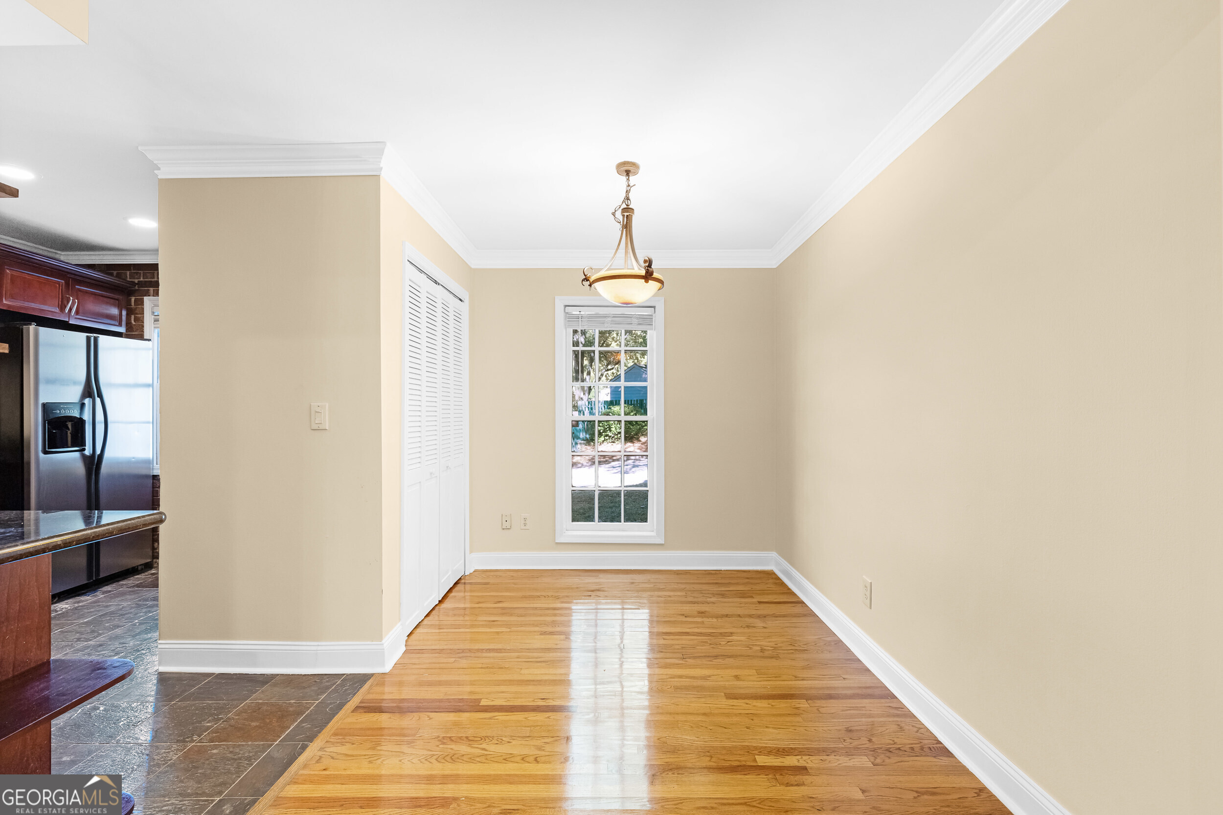 3091 Colonial Way Atlanta, GA 30341 - Photo 11 of 26 a view of a hallway with wooden floor and a living room