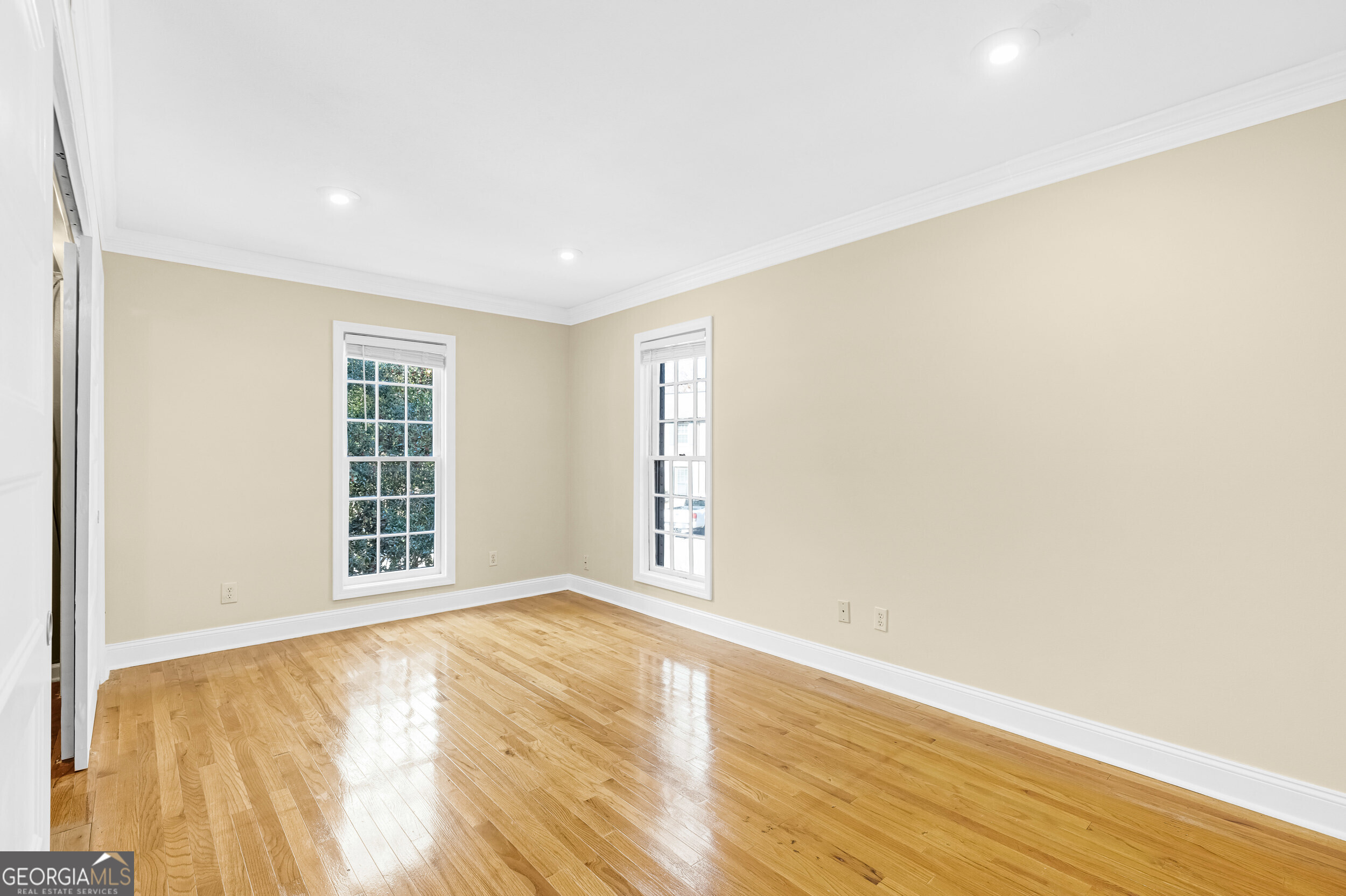 3091 Colonial Way Atlanta, GA 30341 - Photo 12 of 26 a view of an empty room with wooden floor and a window