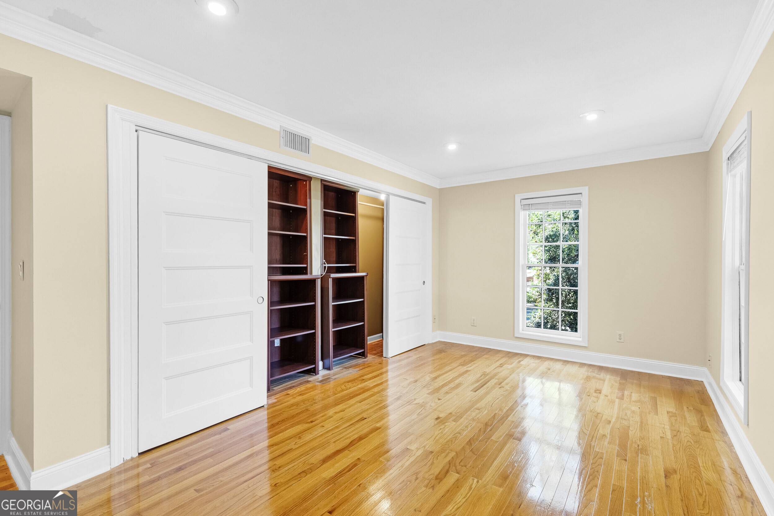 3091 Colonial Way Atlanta, GA 30341 - Photo 14 of 26 wooden floor in an empty room with a window