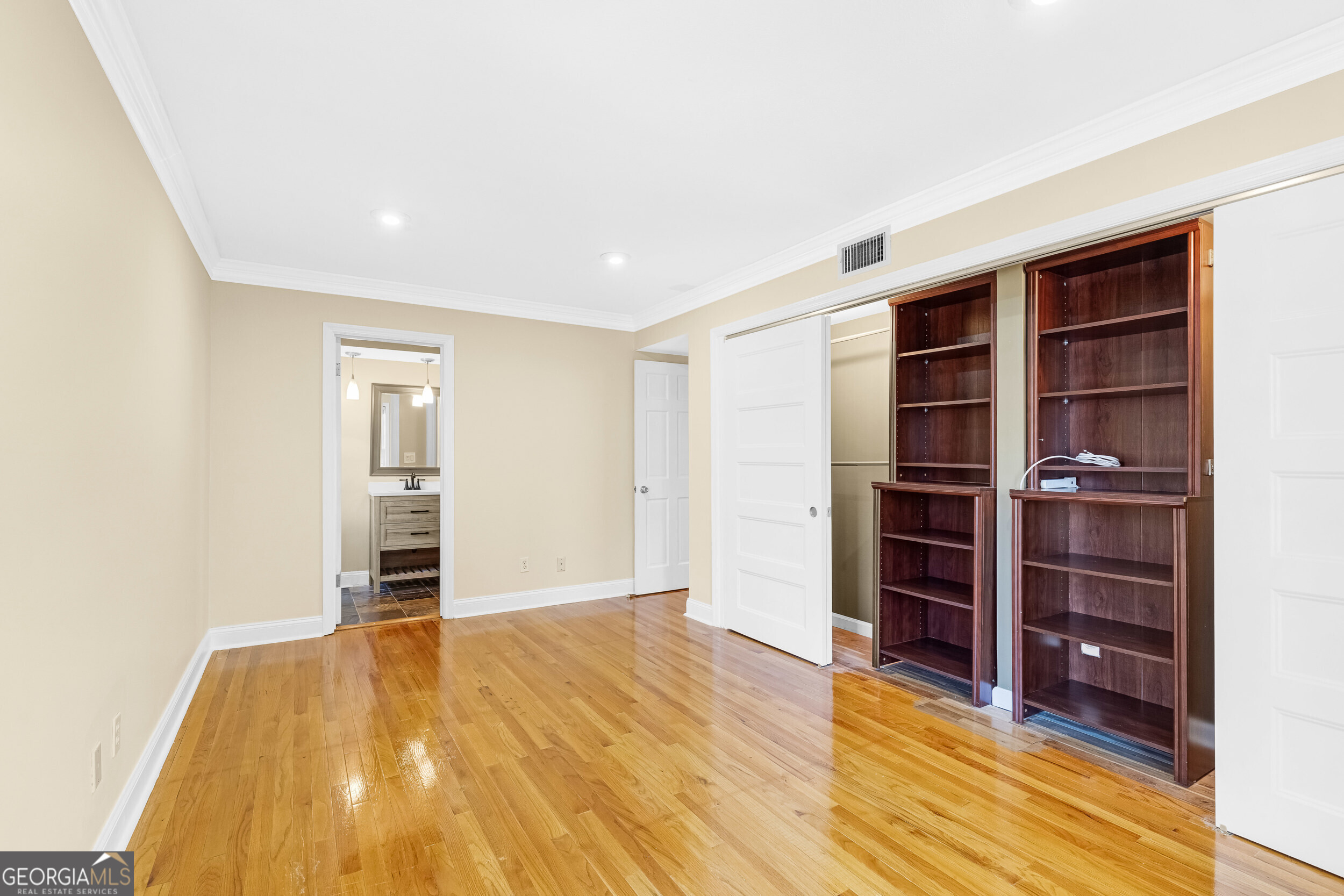 3091 Colonial Way Atlanta, GA 30341 - Photo 15 of 26 a view of empty room with wooden floor and closet