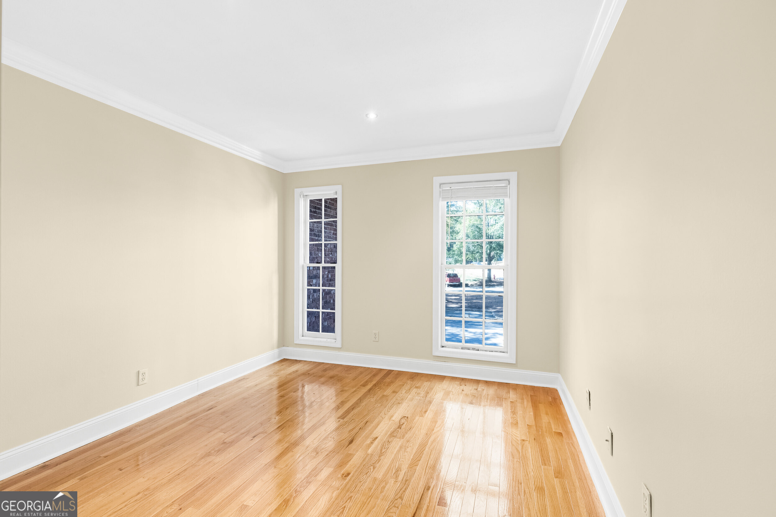 3091 Colonial Way Atlanta, GA 30341 - Photo 17 of 26 an empty room with wooden floor and windows