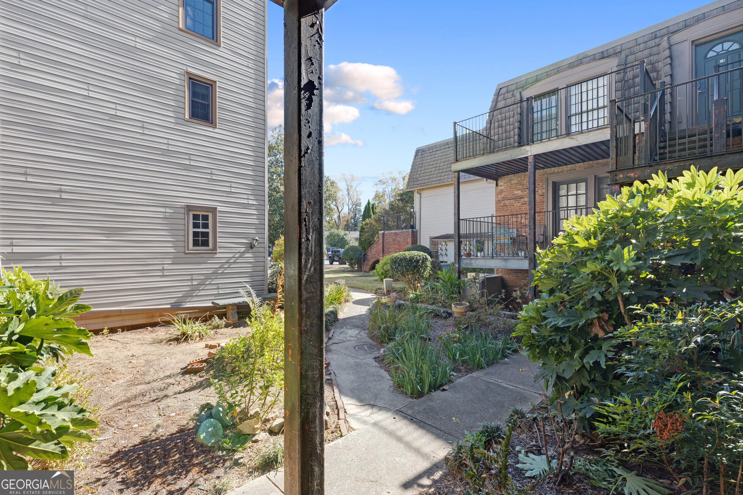 3091 Colonial Way Atlanta, GA 30341 - Photo 21 of 26 a view of a brick house with a yard