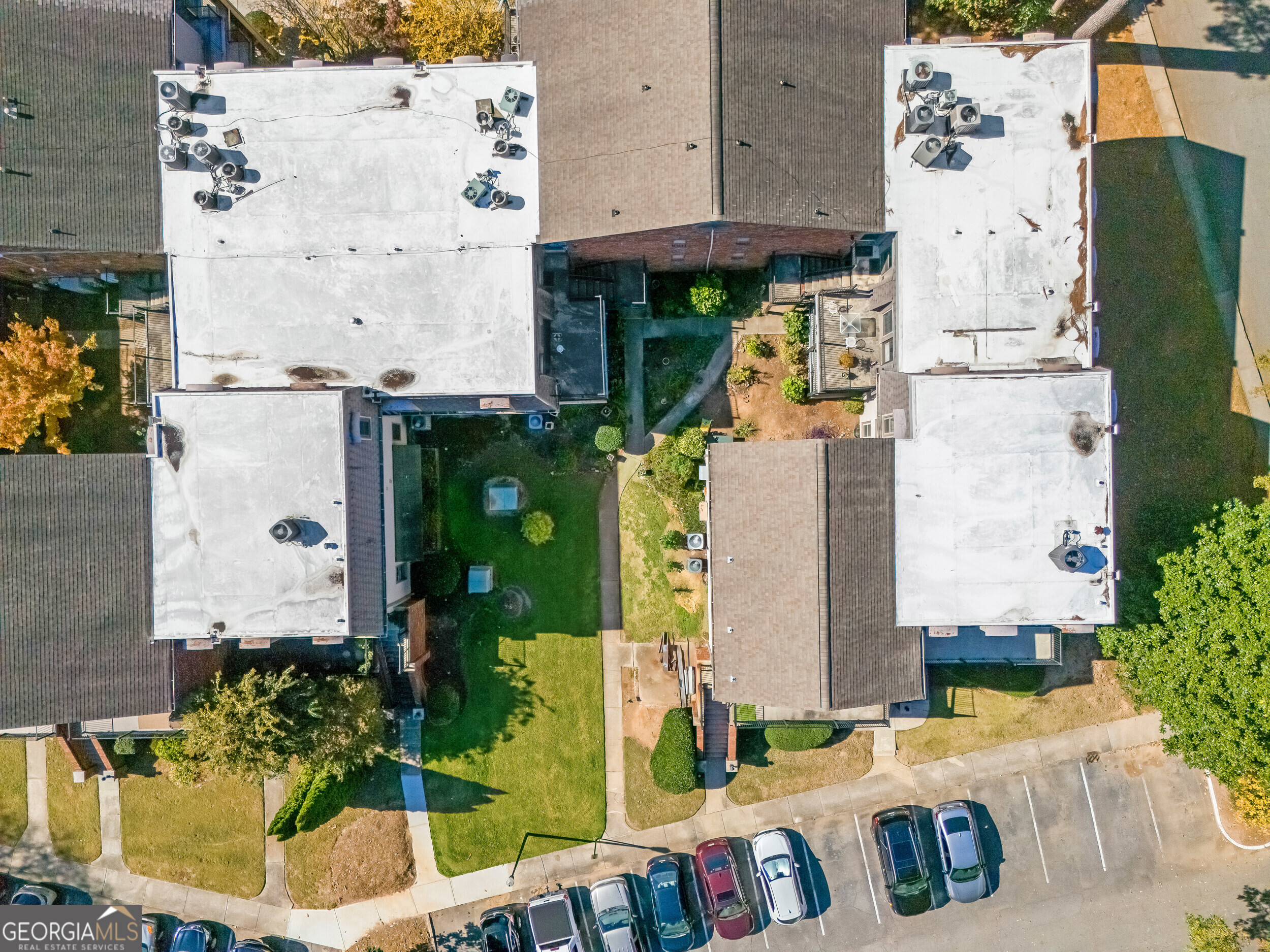 3091 Colonial Way Atlanta, GA 30341 - Photo 23 of 26 an aerial view of multiple houses with outdoor space