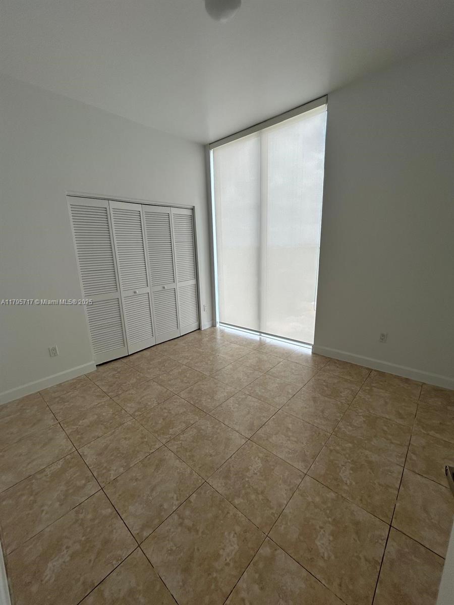 2525 Southwest 3rd Avenue, Unit 1402 Miami, FL 33129 - Photo 17 of 37 an empty room with a empty space