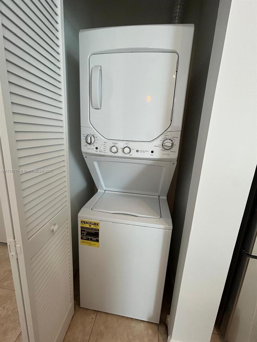 2525 Southwest 3rd Avenue, Unit 1402 Miami, FL 33129 - Photo 25 of 37 a utility room with dryer and washer