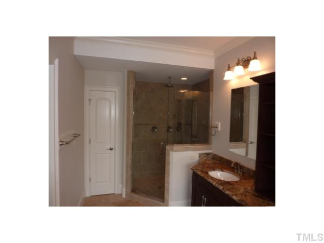 4513 Pitt Street Raleigh, NC 27609 - Photo 13 of 17 rain forest shower overhead, shower head on wall with conventional sprayer as well