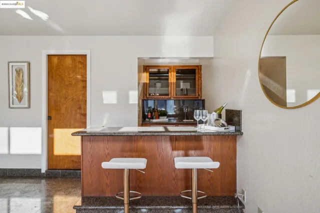a view of a kitchen with table and chair