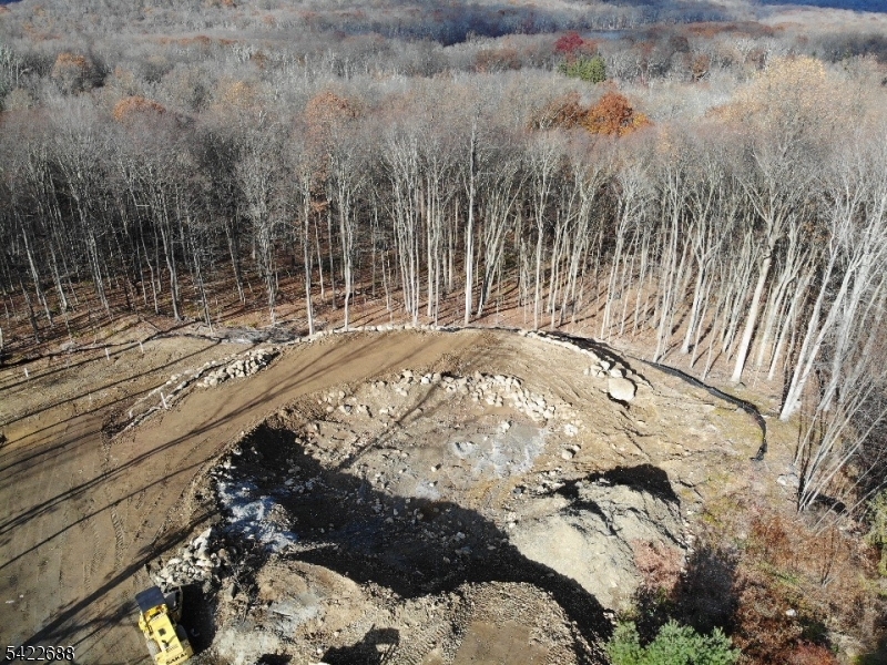 10 Pineview Lane Boonton, NJ 07005 - Photo 8 of 8 a view of a backyard with wooden fence