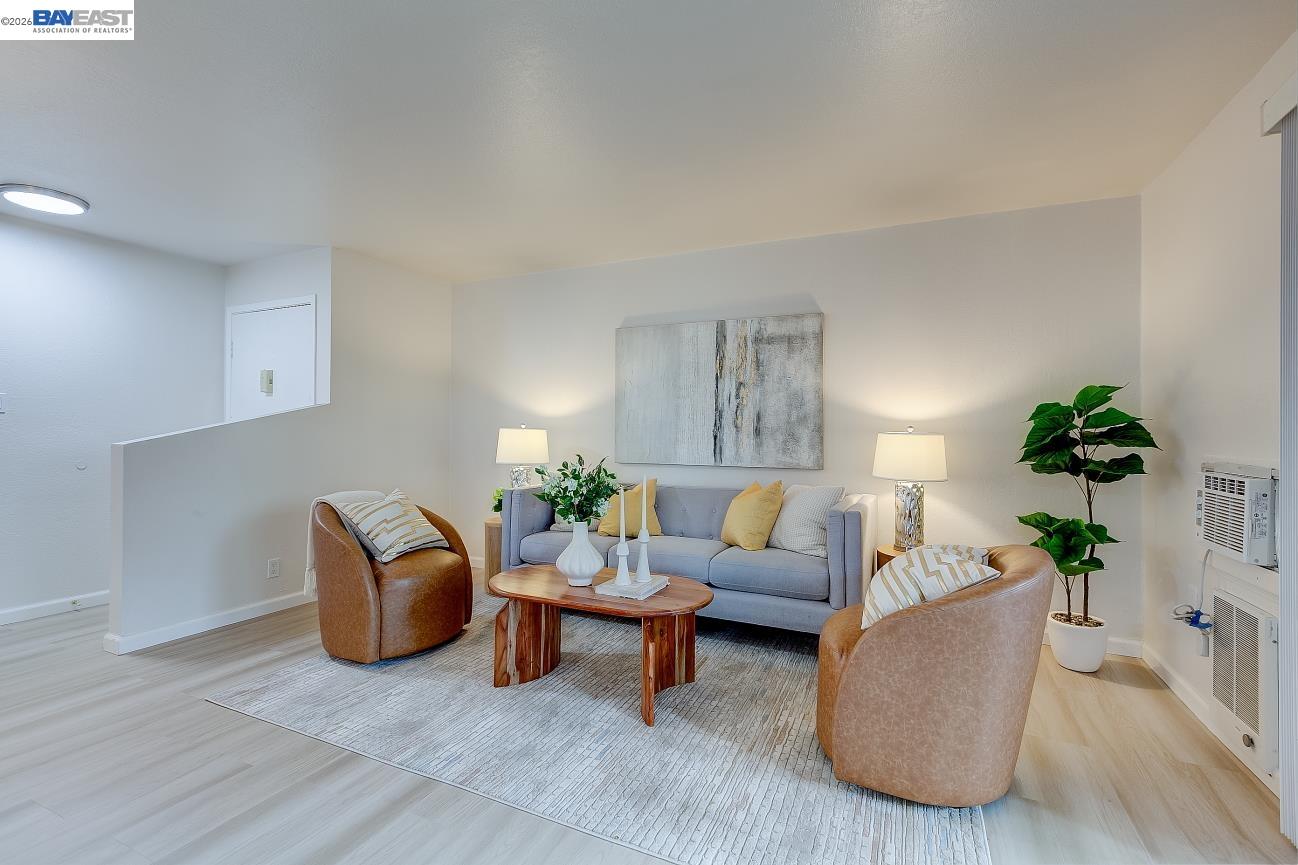 9005 Alcosta Boulevard, Unit 199 San Ramon, CA 94583 - Photo 15 of 57 a living room with furniture and a potted plant