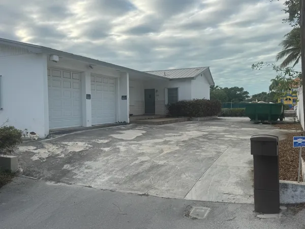 a view of a backyard of a house